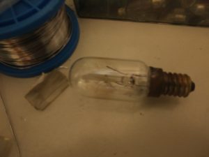 The light bulb with the filament broken in multiple pieces